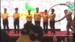 Chinese manager spanking female employees for poor performance watch video  वनइंडिया हिन्दी