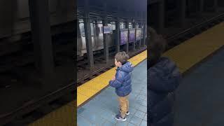 Julian waits for the Market-Frankford subway at 2nd and Market in Philadelphia PA - December 2022