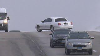 Vehicles sliding on Highway 367 from a dusting of snow in Florissant MO - January 27 2022