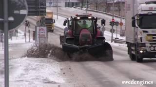Valtra T202 and Volvo L60G plowing snow