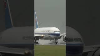 BOEING 777 LANDING with WATER SPRAY