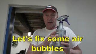 Drywall pits and bubbles fixed with a spray bottle