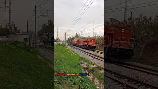 Crossing of a train composed of 3 Diesel locomotives heading to Algiers  مرور ثلاث قاطرات ديازال