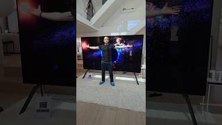 Checking out the UKs BIGGEST TV from TCL What do you guys think would this fit in your hallway?
