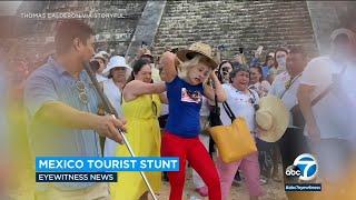 Tourist booed doused with water after climbing Mayan pyramid in Mexico