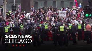 Anti-war protesters police clashed outside exhibition in Melbourne Australia