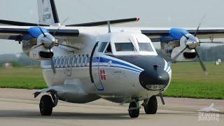 Turbolet L-410 turns over the airfield. Shows aerobatics.