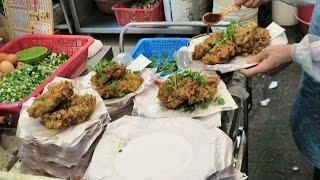 Hong Kong Street Food. Making  a Fried Oysters Cake. Seen in Kowloon