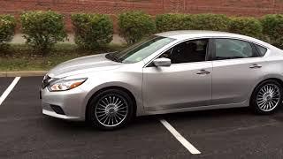 2016 Nissan Altima sitting on Velocity 11 chrome wheels and 22545R18 Lexani tires