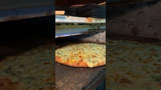 The legendary ARTICHOKE PIZZA in the making from Artichoke Basille’s Pizza NYC  #DEVOURPOWER