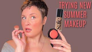 TRYING NEW SUMMER MAKEUP  NEW FENTY BLUSHLIGHTER  SAIE DEW BRONZE