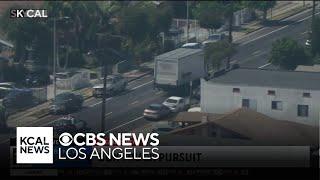 Carjacking suspect in box truck leads police on pursuit through South LA