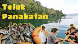 Spearfishing ke teluk Panahatan di Danau Toba. Panen ikan langsung masak di tempat
