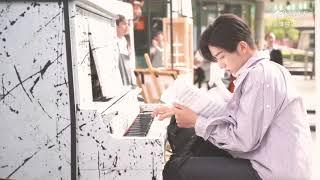 Zhang Xincheng Playing Piano Behind the Sets of Symphonys Romance