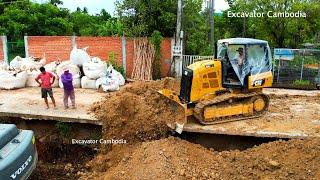 BeCareful Dump Truck Working Unloading Dirt Landslide Protection And Cat Dozer Pushing Soil To Slope