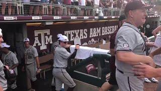 WATCH NOW Jim Schlossnagle gets cooler bath after Texas A&M punches ticket to College World Series