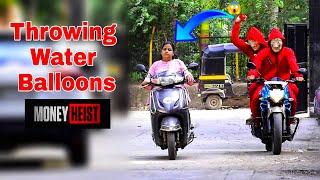 Throwing Water Balloons with twist  Throwing Water Balloons Prank Part 2  Prakash Peswani Prank