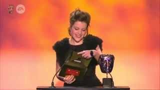 Georgie Henley presents an award at BAFTA