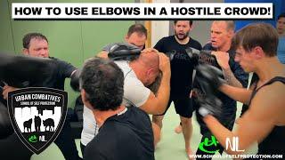 HOW TO USE ELBOWS IN A HOSTILE CROWD