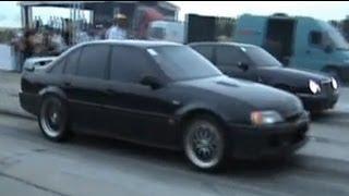 Lotus Omega Carlton Vs. Mercedes E55 AMG Drag Race 14 Mile