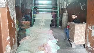 Ironing of clothes bundles in a factory  #ironing #ironingmachine