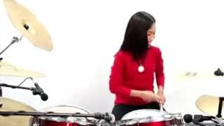 Talented malaysian girl drummer drumming a hindi song