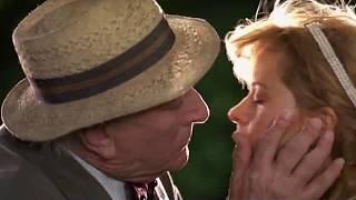 An old man is kissing with the bride at the wedding