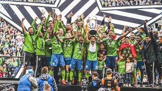 Seattle Sounders FC lift the Philip F. Anschutz trophy after winning 2019 MLS Cup