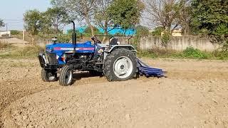 Powertrac euro 42 on 9 tine cultivator  Euro 42 