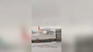 WATCH Moment plane is swallowed up in Dubai floods