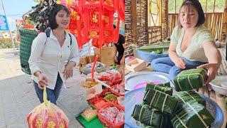 Girl goes to the market to shop for Tet items wrapping traditional rice cakes.