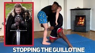 Tired of getting guillotined going for double legs? Try this defense