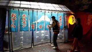 600 Yen for a Bowl of Ramen Close-up on a Food Stall Owner at Midnight