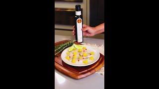 Carpaccio de vieira com laranja regado com azeite