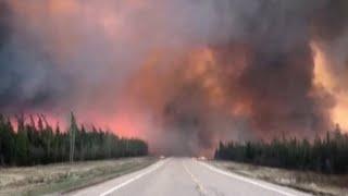 WATCH  Plumes of wildfire smoke fill the sky in Northwest Territories