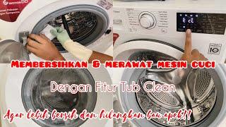 Membersihkan dan merawat mesin cuci dengan fitur Tub Clean  agar lebih bersih dan hilangkan bau