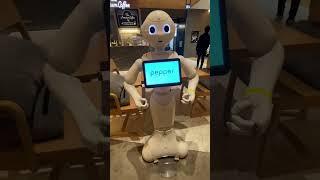 Pepper PARLOR café featuring human interaction humanoid robot and Servi from SoftBank Robotics