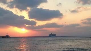   Setting Sun and Gigantic Cruise Ship at Ishigaki Port