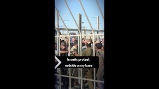 Israelis protest outside army base