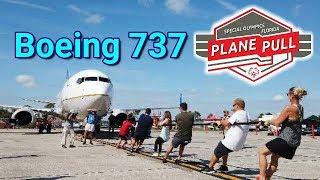 Boeing 737 plane pull tug of war Special Olympics Florida