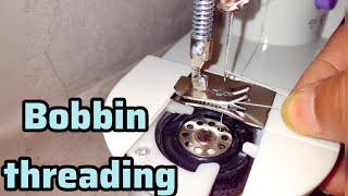 Bobbin threading in mini sewing machine  mini sewing machine tutorial