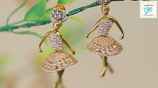 The adoring gold dancing doll earring looks fabulous glowing white stones are eye-catching