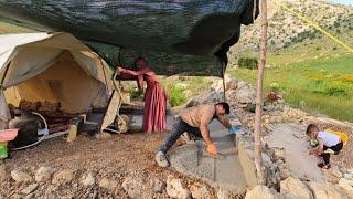 An energetic couple performing the beauty of cement work on the floor of the nomadic canopy