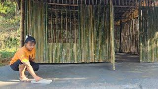 Young mother uses sand and cement alone to complete new house floor