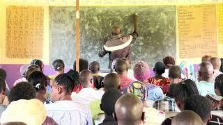 Farmer Training Dr. Isa Luigare Takes Through Poultry Farmers At Seguku Katale Demonstration