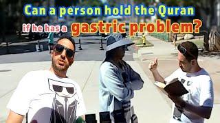 Can a person hold the Quran if he has a gastric problem?