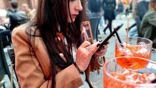 Woman with a cocktail and smoking