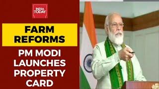 PM Narendra Modi Launches Property Cards Under SVAMITVA Scheme Farm Reforms