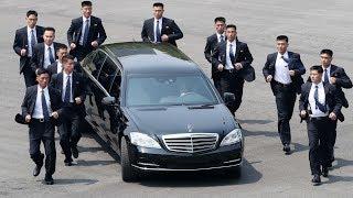 Kim Jong-uns bodyguards jog alongside limo