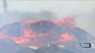 Large pallet fire continue to burn in Park City firefighters work to stay safe during heat